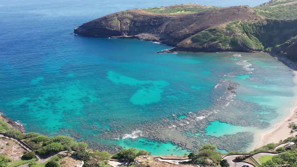 Close-up aerial panning shot of Hanauma Bay Nature Preserve on the island of O'ahu, Hawaii. 4K