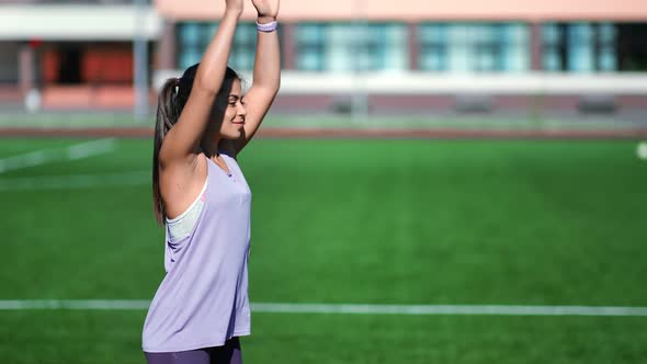 Pleasant Girl Practicing Summer Morning Outdoor Training Waving Hands