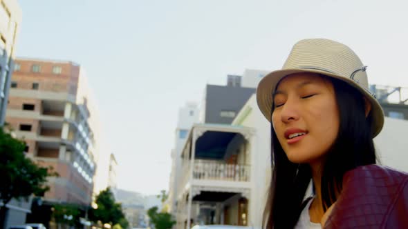 Woman standing in city street