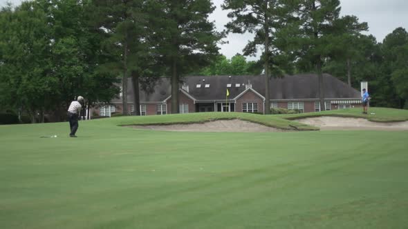 golfer on a green golf course