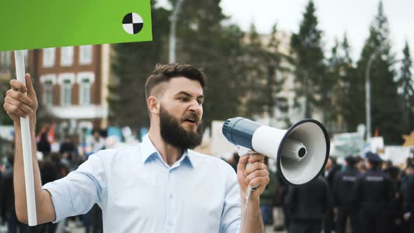 Man at Political Meeting with Banner with Points for Tracking To Copy Space Text