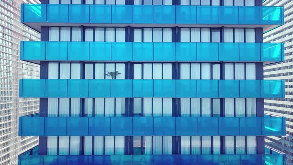 facade of a modern mirrored office building was removed from a drone. close-up