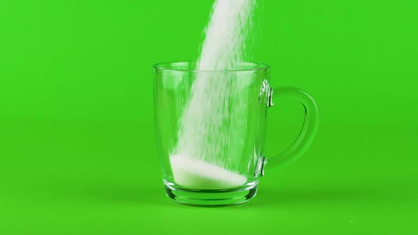 Pour Sugar Mug Glass Thick Bottom Green Contrasting Background Slow Motion