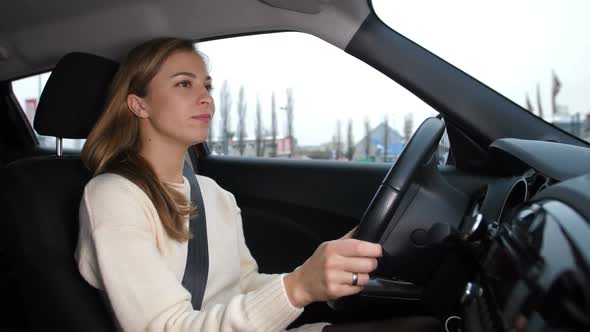 The Girl Drives a Car Happily Sings and Dances  Slow Mo