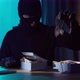 Portrait of a Robber in a Balaclava with Jewelry in His Hands - VideoHive Item for Sale