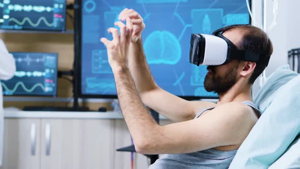 Patient with Virtual Reality Goggles in a Modern Facility for Brain Research