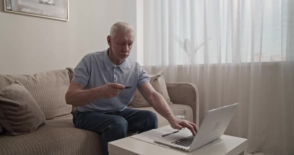 Senior Man Making Online Purchases