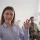 Young Woman Opening Door and Meeting Guest Man Veteran in Wheelchair Waving to Camera Enjoying Visit - VideoHive Item for Sale