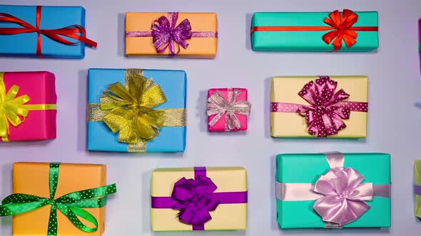 Gift Boxes On Blue Background With Blank Space At The End  alt