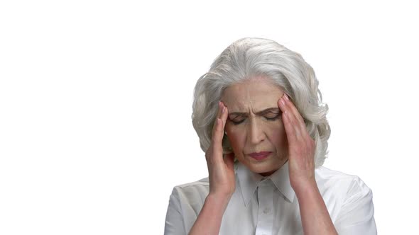 Close Up Mature Woman Suffering From Headache