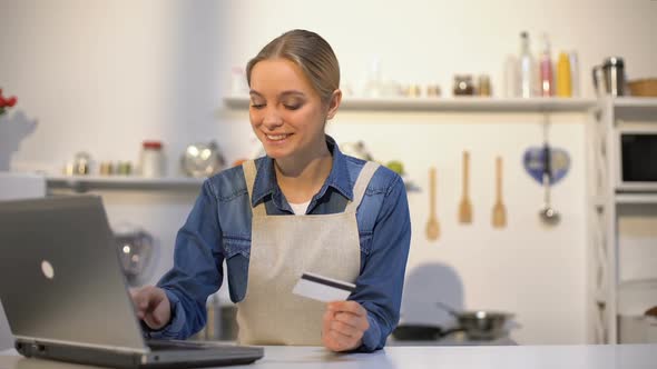 Girl Paying for Groceries With Credit Card Online and Food Appears Immediately