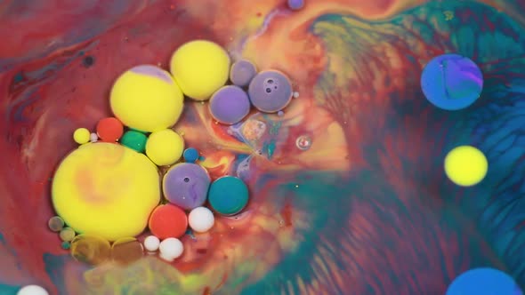 Abstract Multicolored Bubbles Paint. Slow Motion. Top View