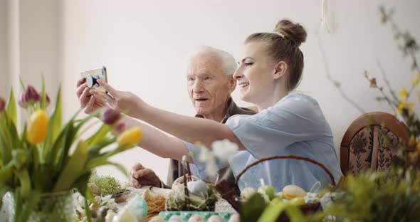 Senior Man and Woman Taking Selfie Photo at Easter Holidays.