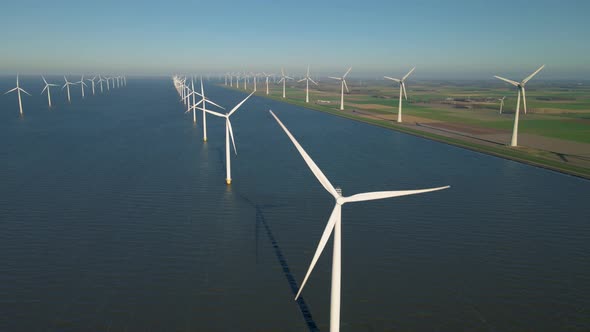 Windmill Park in the Ocean Drone Aerial View of Windmill Turbines Generating Green Energy Electric