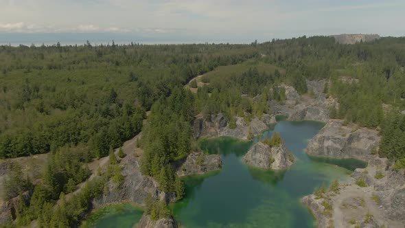 Beautiful Aerial View of the Colorful Lakes in the Canadian Nature during a sunny summer day. Taken