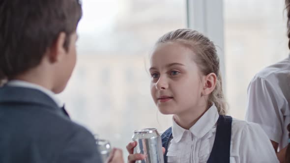 Middle School Children Relaxing after Lesson alt