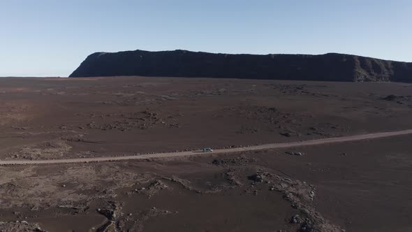 Aerial view of a car driving a serpentine road, Reunion.