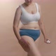 Young Fullfigured Anonymous Caucasian Woman Applying Selftanner to Look Beautiful with No Sunbathing - VideoHive Item for Sale
