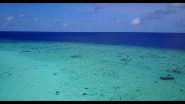 Aerial drone shot tourism of perfect tourist beach time by aqua blue lagoon and white sand backgroun
