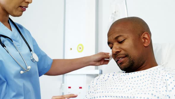 Female doctor interacting with patient