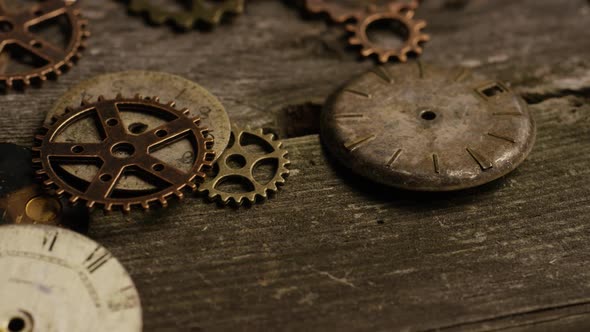 Rotating stock footage shot of antique and weathered watch faces