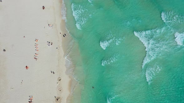 Top down view of beach at water's edge in Cancun