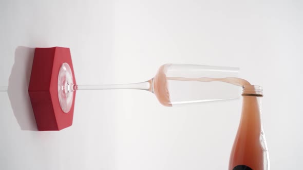 Vertical video, Close-up: alcoholic liquor being poured into a glass