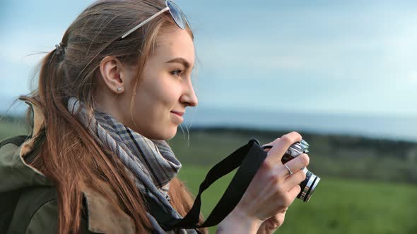 Hiker Female Making Picture of Natural Sea Sky and Pond
