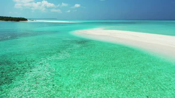 Aerial top view tourism of relaxing coast beach adventure by blue ocean and white sandy background o