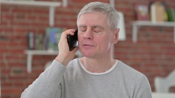 Cheerful Senior Old Man Talking on Smartphone