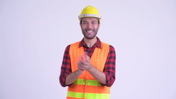 Happy Bearded Persian Man Construction Worker Clapping Hands