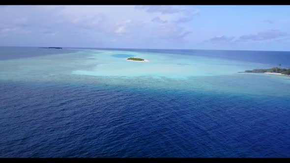 Aerial top view sky of relaxing coast beach trip by aqua blue ocean with white sandy background of a