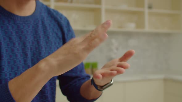 Closeup of Male Hands Using Sign Language for Communication Indoors