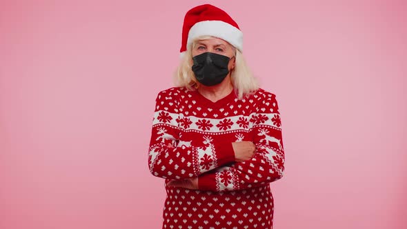 Senior Christmas Grandmother Wearing Face Mask Ppe to Safe From Coronavirus on Lockdown Quarantine