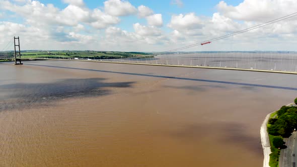 Aerial footage of The Humber Bridge, near Kingston upon Hull, East Riding of Yorkshire