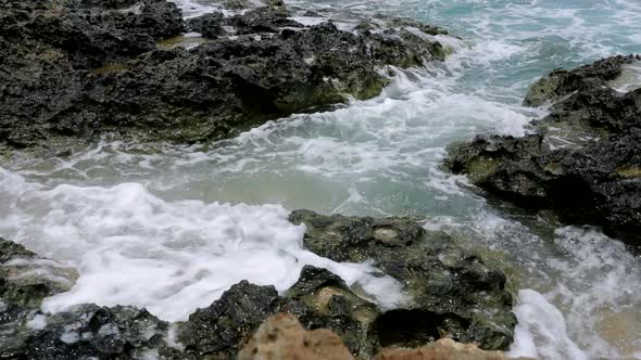 Sea waves crashing on the rock