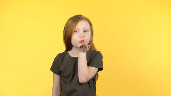 Little Girl Posing and Blows Kiss To Someone