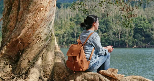 Woman enjoy view of the lake