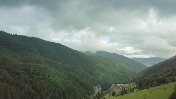 Mountain Peaks and Morning Sky with Smooth Moving Clouds