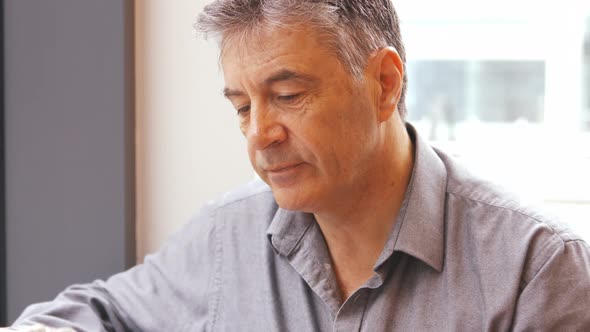 Businessman having cup of coffee