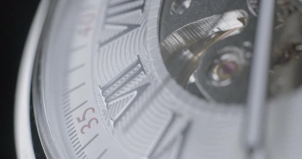 Watch tourbillon rotating macro slowmotion