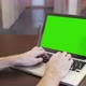 Man Using Laptop Screen at The Desk - VideoHive Item for Sale