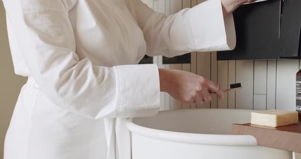 Woman's Hands Open a Modern Faucet with Sink Minimalist Interior Accessories