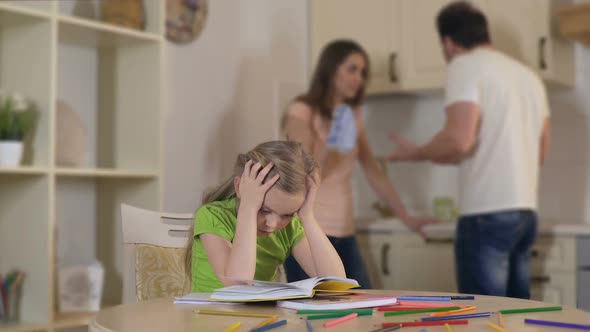 Upset Child Listening Divorcing Parents Fight, Suffering From Conflict in Family