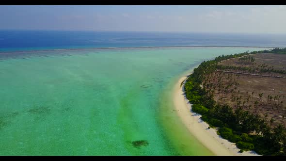 Aerial top view travel of perfect island beach break by transparent lagoon and white sandy backgroun