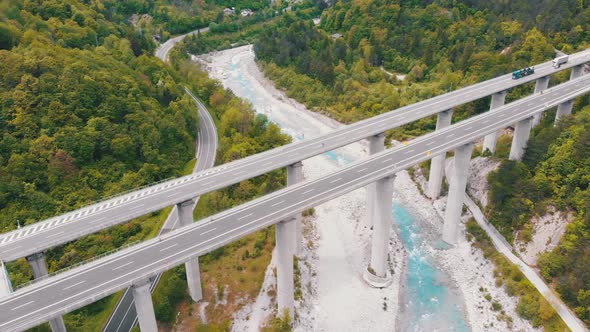 Aerial View of the Concrete Highway Viaduct on Concrete Pillars in the Mountains