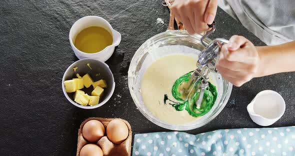 Woman whisking batter 4k