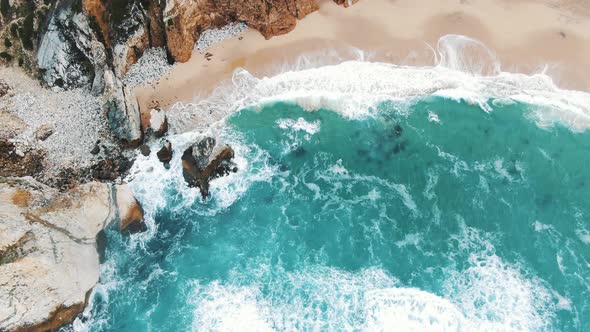 Azure Ocean Waves Roll on Empty Sea Coast with Cliff Rocks Cabo Da Roca (Portugal)