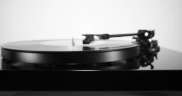 Pushin to Black Turntable with Spinning Vinyl Record on