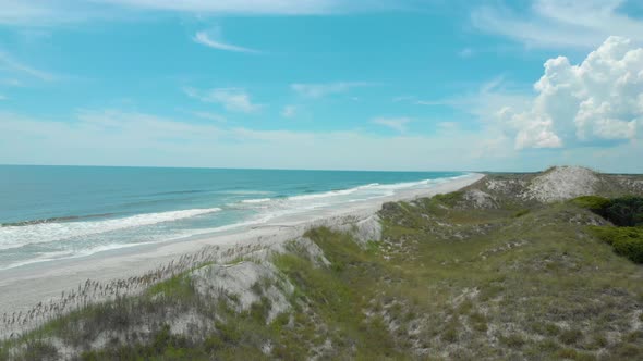 drone shots of the sand dunes and marsh lands at the coast